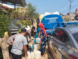 Polsek Marbo Polres Takalar Kawal Kegiatan Pendistribusian Air Bersih Untuk Warga